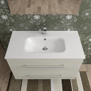 Mobile bagno t.b.t. con lavabo da appoggio bianco e due cassetti.