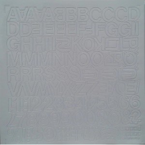 Lettere e numeri grigi t.b.t. adesivi, ideali per etichettare.