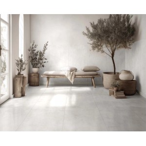 Stanza luminosa con piastrelle per pavimenti t.b.t., panca e piante.