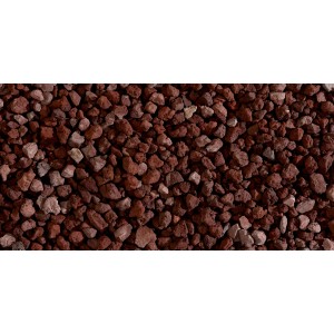 Primo piano di ciottoli/granulati decorativi rossi.