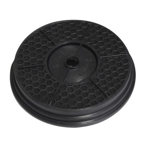 Filtro rotondo nero per cappe aspiranti.