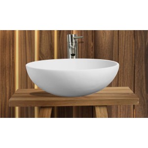 Lavabo d'appoggio t.b.t. bianco rotondo su consolle in legno con rubinetto.