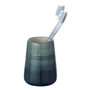 Portaspazzolino Pottery petrolio di Wenko con due spazzolini da denti.