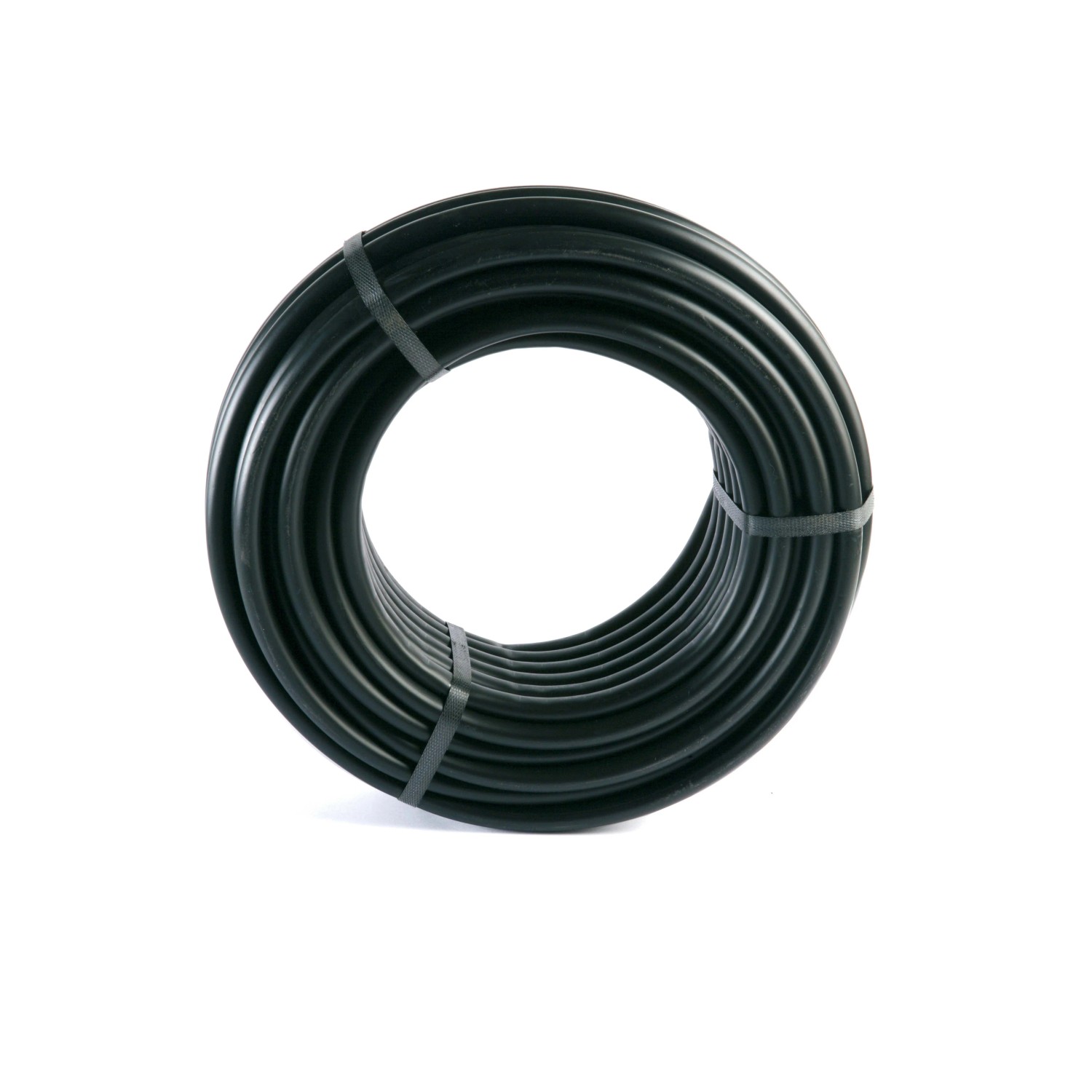 Tubo nero in PE per irrigazione interrata, arrotolato.