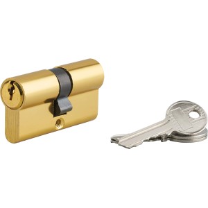 Cilindro color oro con chiavi per la sicurezza della porta.