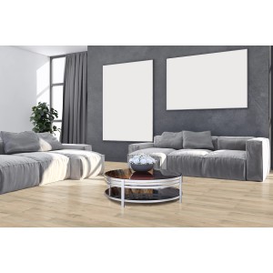 Pavimento vinilico chiaro t.b.t. in un soggiorno moderno con divani grigi.