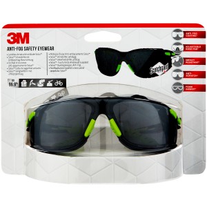 Occhiali protettivi 3M Solus 1000 confezionati, con lenti grigie e dettagli verdi.
