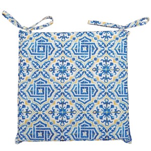 Cuscino quadrato per sedia con motivo a piastrelle blu e giallo e lacci.