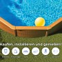 Piscina rotonda Gre Pool Pacific con effetto legno, Ø 460 cm. Piscina con pareti in acciaio, acqua blu e palla gialla.