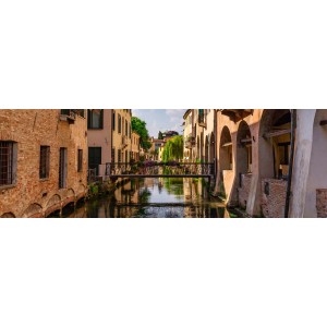 Quadri: Canale a Treviso, Italia, con ponte e case antiche.
