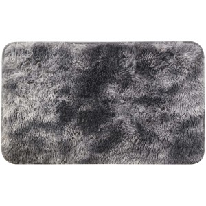 Tappeto a pelo lungo rettangolare grigio.