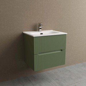 Mobile bagno verde con lavabo e due cassetti.