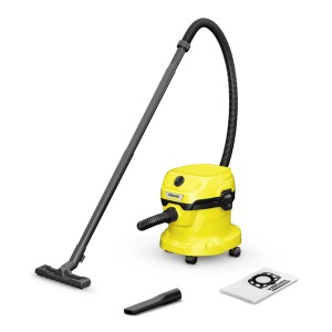 Aspiratore multiuso giallo Kärcher con accessori come bocchetta e sacchetto per aspirapolvere.