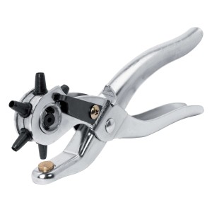 Pinza fustellatrice a revolver argentata con varie dimensioni di fori.
