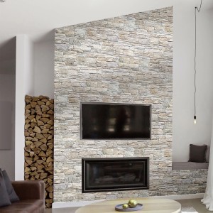 Rivestimento parete con piastrelle t.b.t. effetto pietra, montato in soggiorno con camino.