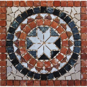 Piastrella a mosaico con motivo a stella nei toni del rosso, nero e bianco.