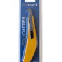 Taglierino Policuttermesser giallo t.b.t. in confezione con lame di ricambio.