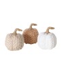 Tre zucche decorative in bianco, beige e marrone, ideali come regalo.