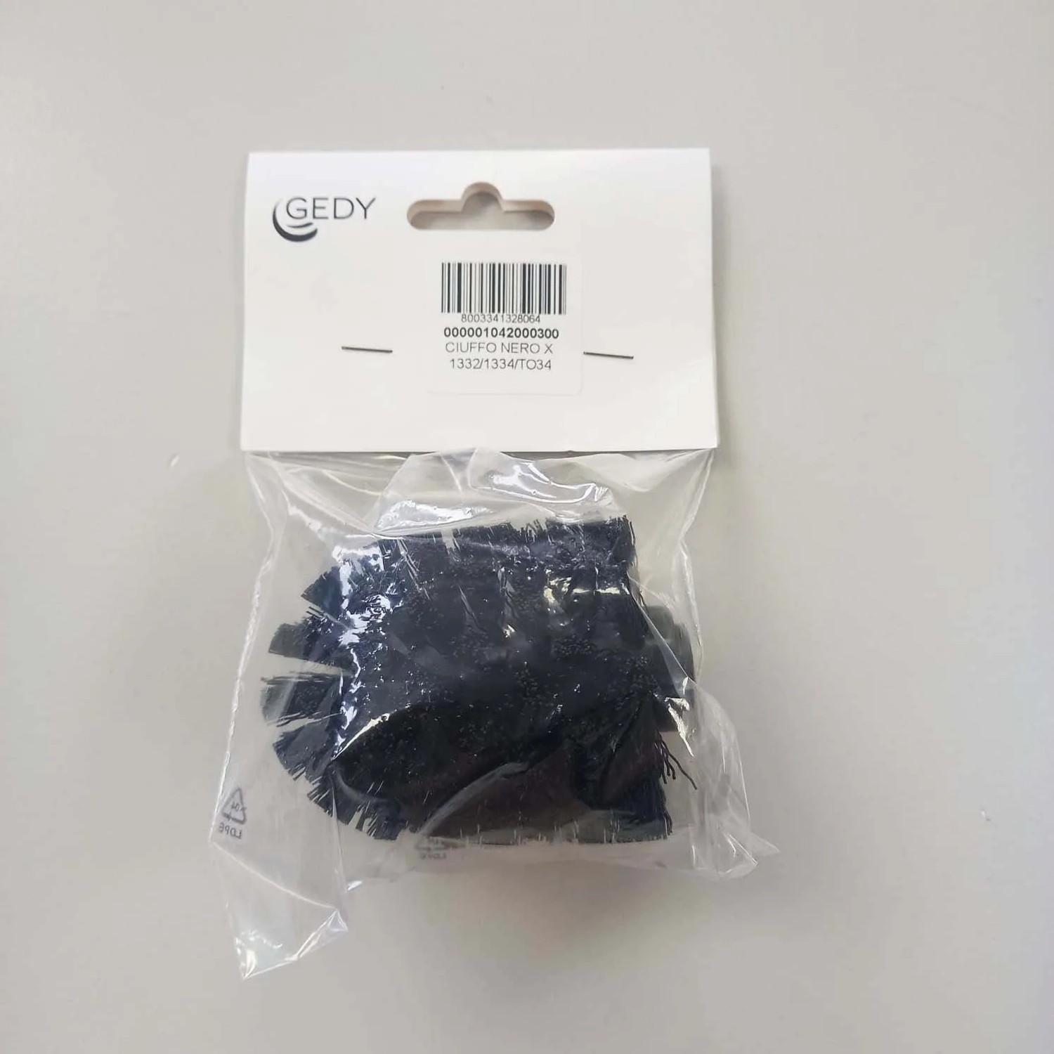 Testina di ricambio nera t.b.t. per Scopini WC, confezionata.
