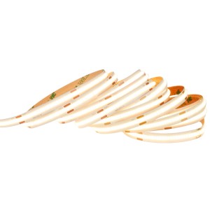 Striscia LED flessibile, arrotolata, con striscia adesiva sul retro.