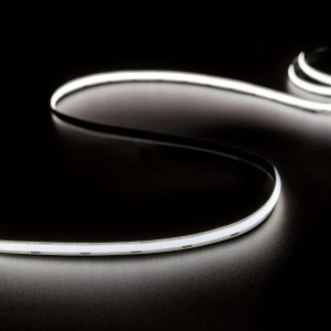 Striscia LED flessibile t.b.t. su sfondo scuro, luce bianca.