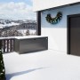 Biohort Stylebox 140, grigio scuro metallizzato, su terrazza innevata. Box universale per giardino e balcone.