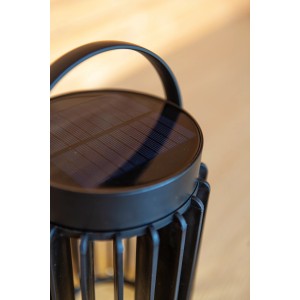 Lampada da tavolo solare nera Lutec Kozy con struttura a griglia e maniglia, Ø 13,7 cm.