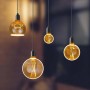 Varie lampadine LED E27 con vetro ambrato e forme diverse.