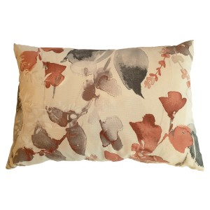 Cuscino decorativo con motivo floreale nei toni del marrone e del grigio.