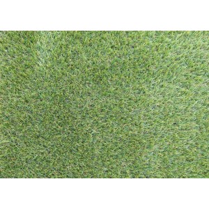 Primo piano di erba sintetica verde t.b.t.