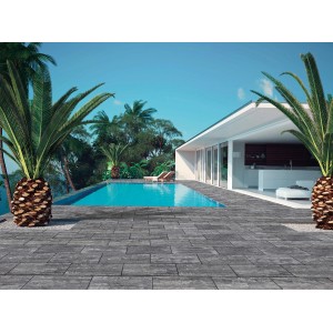 Pavimentazione per esterno t.b.t. grigia posata attorno a una piscina.