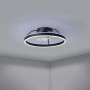 Plafoniera LED moderna t.b.t. con forma rotonda e ventilatore integrato.
