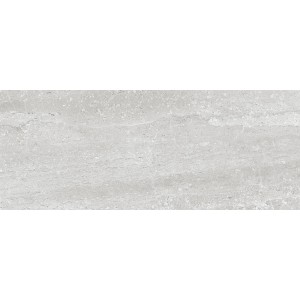 Piastrella da rivestimento grigio chiaro con effetto marmorizzato.