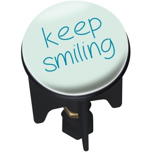 Wenko Tappo lavandino Pluggy Keep Smiling con scritta blu su sfondo chiaro.
