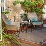 Set di mobili da balcone Aliceville a 3 pezzi in polyrattan verde-grigio con tavolo e sedie.