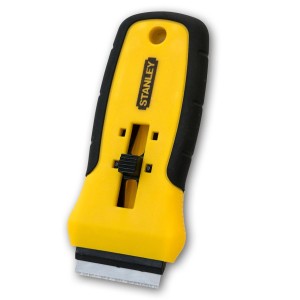 Raschietto Stanley giallo per muratura e piastrellatura.