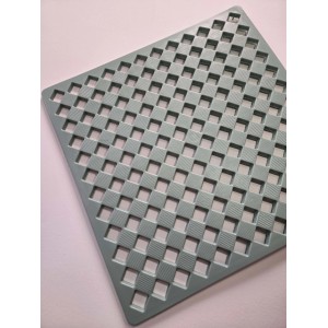 Tappetino da bagno verde chiaro con motivo a griglia quadrata per accessori vasca.