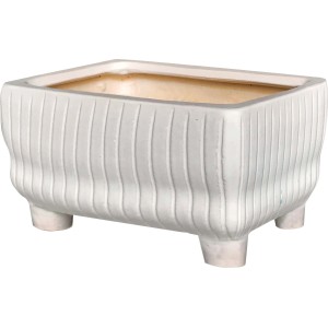 Portavasi t.b.t. rettangolare bianco con piedini e superficie scanalata.