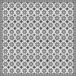 Tappeto moderno con motivo geometrico a stella in bianco e nero.