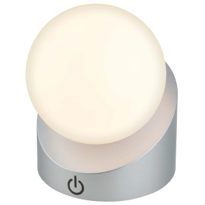 Lampada da tavolo a LED t.b.t. con paralume rotondo luminoso e base color argento.