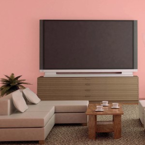 Soggiorno con pittura murale rosa. Pittura per interni colorata per un ambiente accogliente.