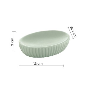 Portasapone ovale verde menta con texture a coste e dimensioni.