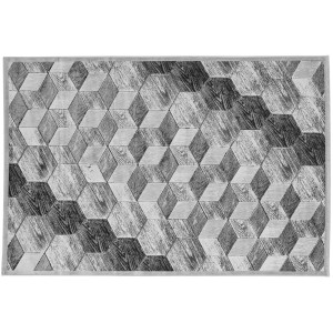 Tappeto moderno con motivo a cubi 3D in toni di grigio e legno.