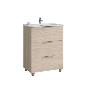 Mobile bagno in legno chiaro con tre cassetti e lavabo da appoggio.