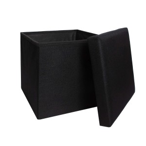 Pouf nero con coperchio removibile, ideale come sgabello o contenitore.