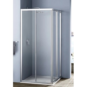 Elegante box doccia angolare t.b.t con pareti in vetro trasparente e telaio argentato.