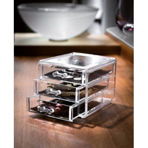 Accessori per mobili da bagno t.b.t. trasparenti con tre cassetti per riporre oggetti.