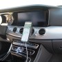 Supporto smartphone t.b.t. in auto, fissato alla griglia di ventilazione.