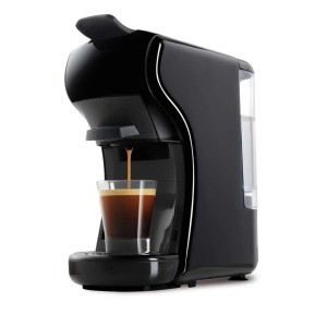 Macchina da caffè t.b.t. nera con bicchiere di caffè. Design compatto.