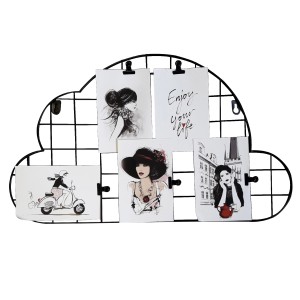 Cornice nera a forma di nuvola con sei foto. Decorazione murale.